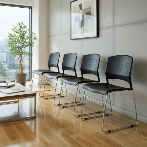 Anu Stack Chair Set of 4 | Sculpted Black Polypropylene | Chrome Sled Base