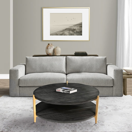 Tali 37 Inch Handcrafted Round Coffee Table, 2 Tier, Charcoal Gray Acacia Wood, Sleek Gold Metal Legs By The Urban Portacia Wood, Sleek Gold