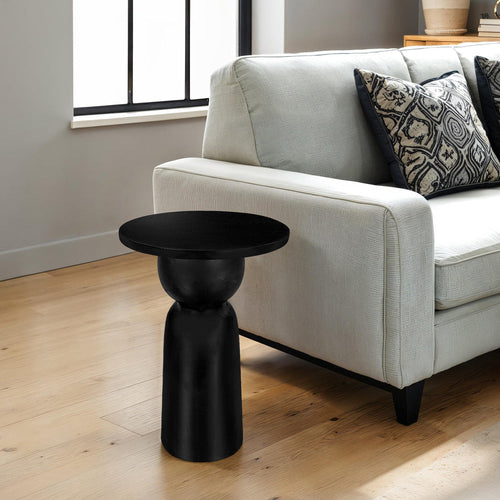 Tia 12 Inch Round Side End Table with Turned Pedestal Base, Mango Wood in Matte Black Finish By The Urban Port