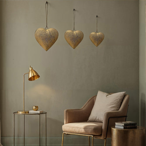 Myri Decorative Metal Heart Wall Decor Set of 3, Antique Gold Iron with Jute Hanging Rope, 12, 9.5, 7 Inches By The Urban Port