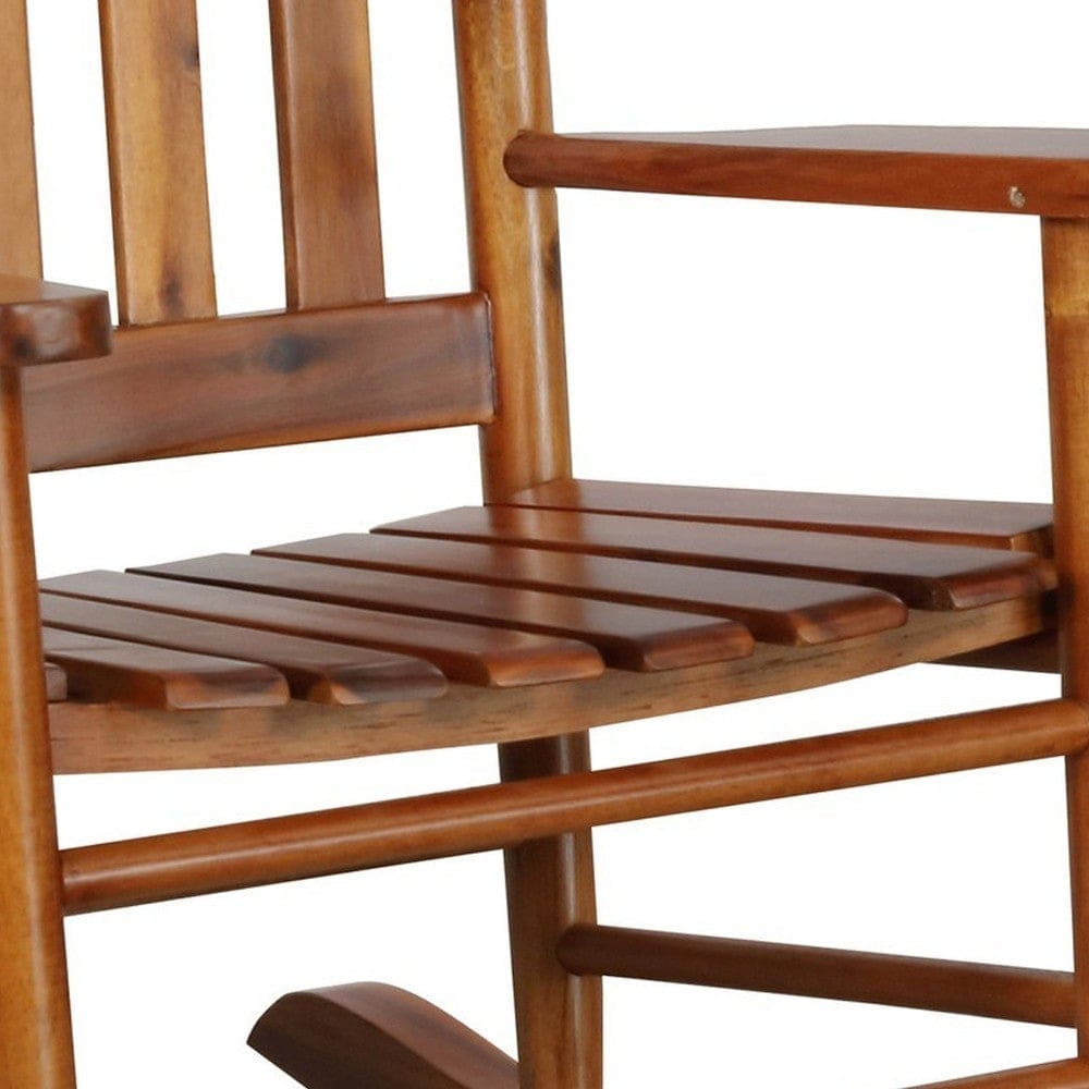 Rocking Chair with Slatted Design Back and Seat Brown By Casagear Home BM246082