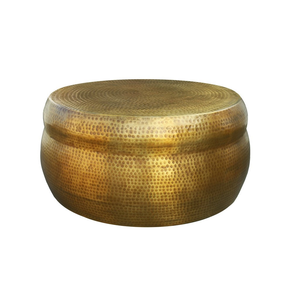 32 Inch Artisanal Round Drum Coffee Table, Hammered Embossed Texturing, Aluminum, Antique Brass By The Urban Port