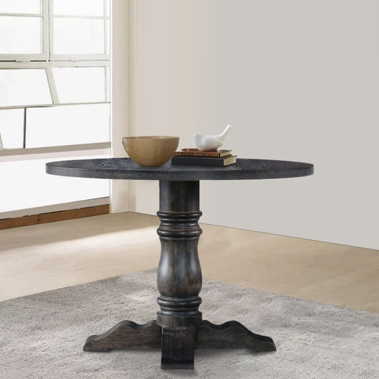 Wooden Round Dining Table With Heavy Pedestal Feet, Weathered Gray By Casagear Home