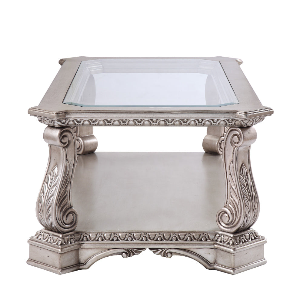 Wooden Coffee Table with Inserted Glass Top and Scrolled Legs, Silver and Clear - 86930