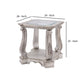 Antique Wooden End Table with Polyresin Engravings and Glass Top Silver and Clear By Casagear Home AMF-86932