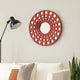 Contemporary Wooden Round Wall Decor with Circle Cut Outs, Red and Silver