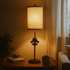 Metal Table Lamp with Cylindrical Drum Shade and Fleur De Lis Accent,Black
