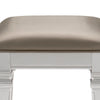 Leatherette Padded Vanity Stool with Tapered Legs and Molded Detail, Silver By Casagear Home