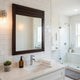 Wall Mirror with Wooden Carvings and Scrolled Frame, Gold