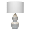 Ceramic Table Lamp with Neutral Waves Pattern, White and Blue By Casagear Home