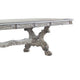 Dining Table with Scrolled Motifs and Claw Feet, Silver