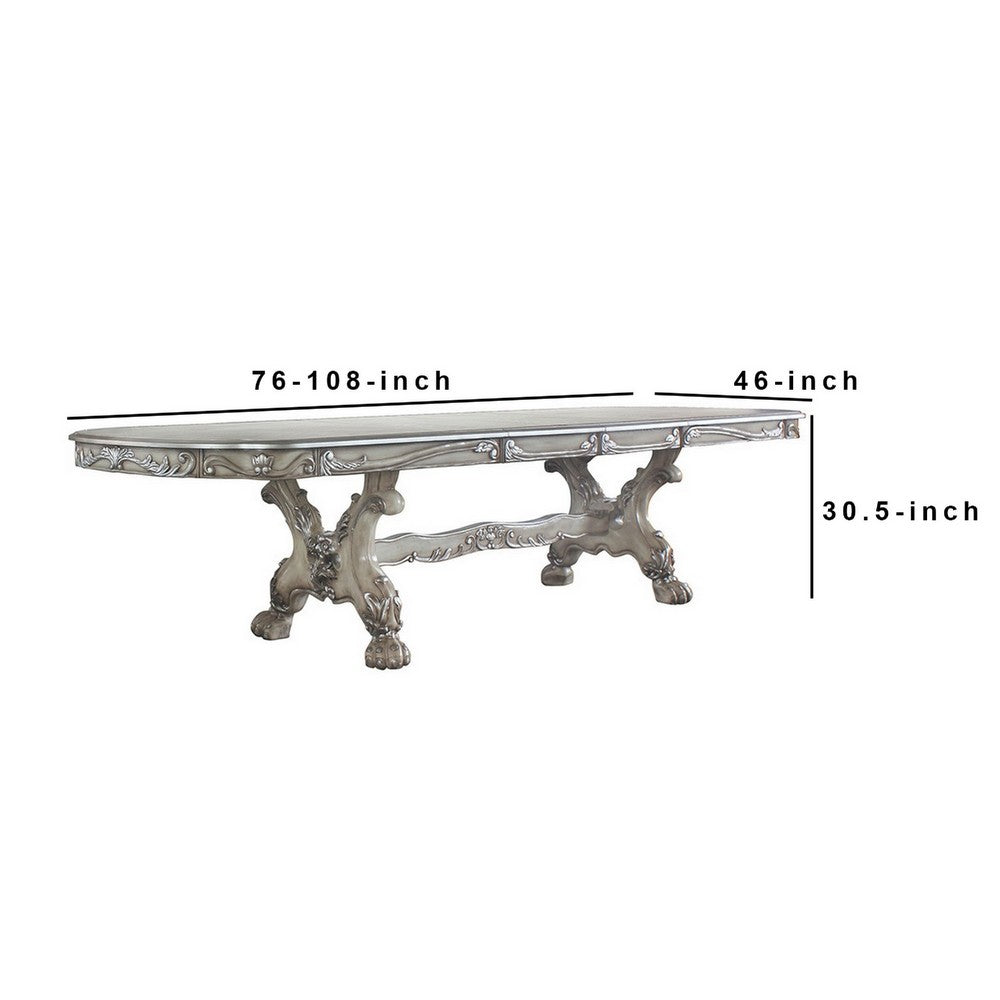 Dining Table with Scrolled Motifs and Claw Feet, Silver