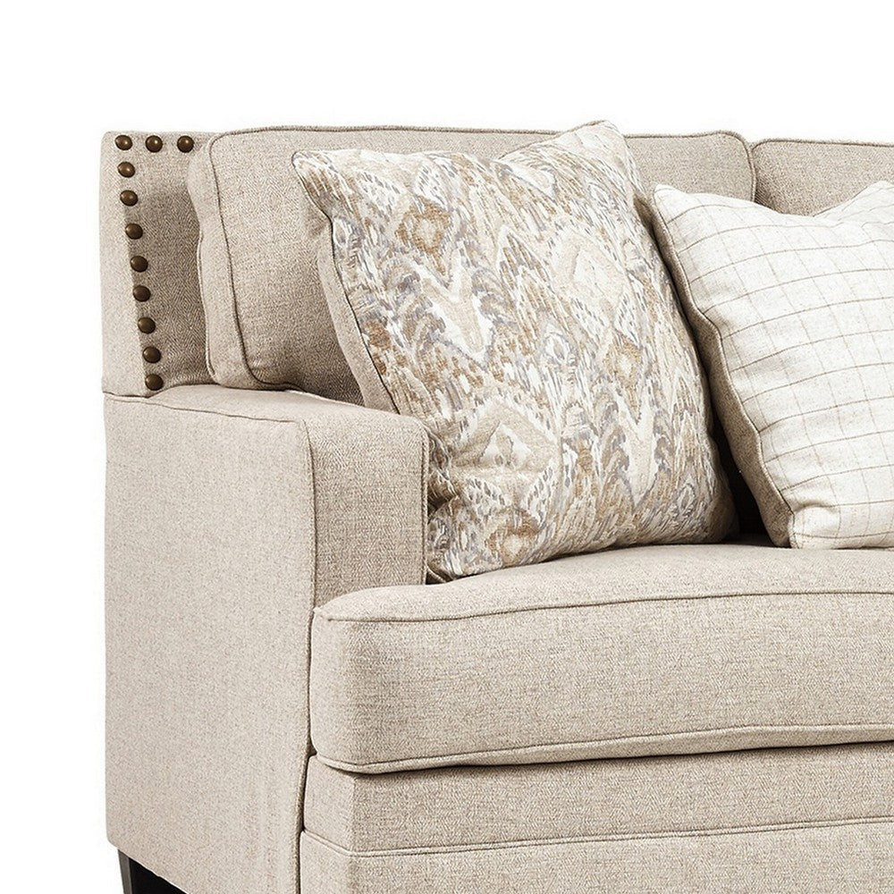 84 Inch Cushioned Sofa Beige Polyester Nailhead Trim 4 Accent Pillows By Casagear Home BM299214