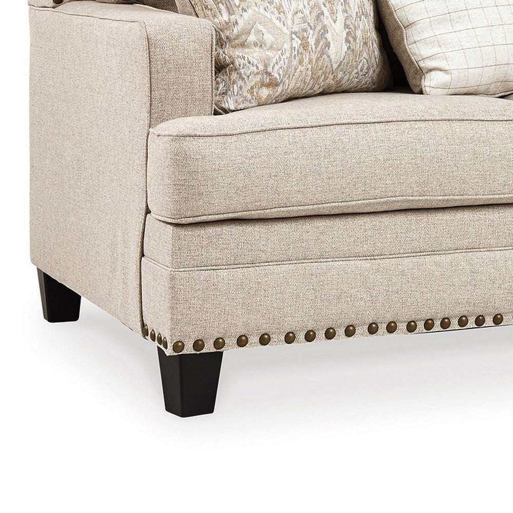 84 Inch Cushioned Sofa Beige Polyester Nailhead Trim 4 Accent Pillows By Casagear Home BM299214