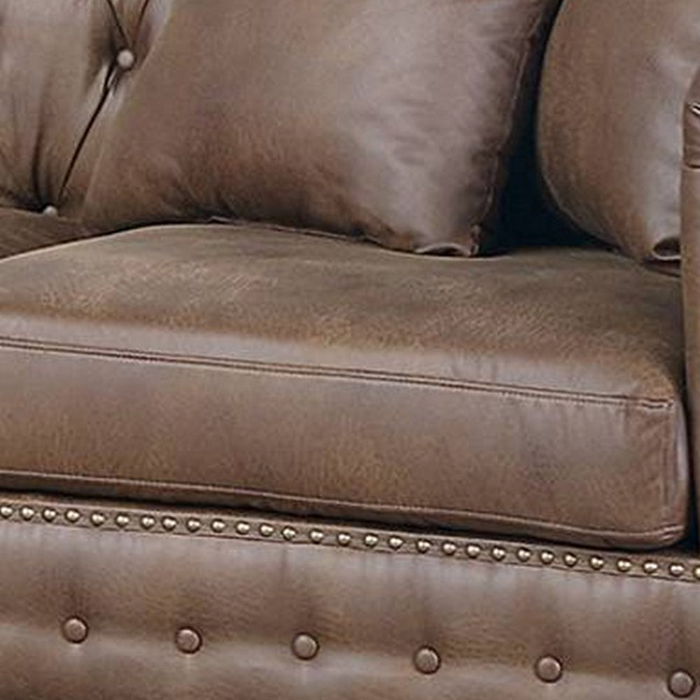 Simi 61 Inch One Arm Chaise 2 Pillows Nailhead Trim Brown Faux Leather By Casagear Home BM300276