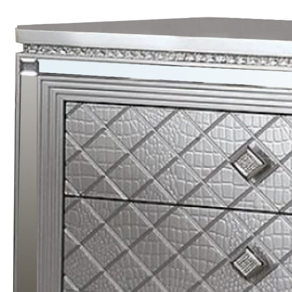 Fery 29 Inch Nightstand with 3 Drawers Crossed Design Silver Finish BM300501