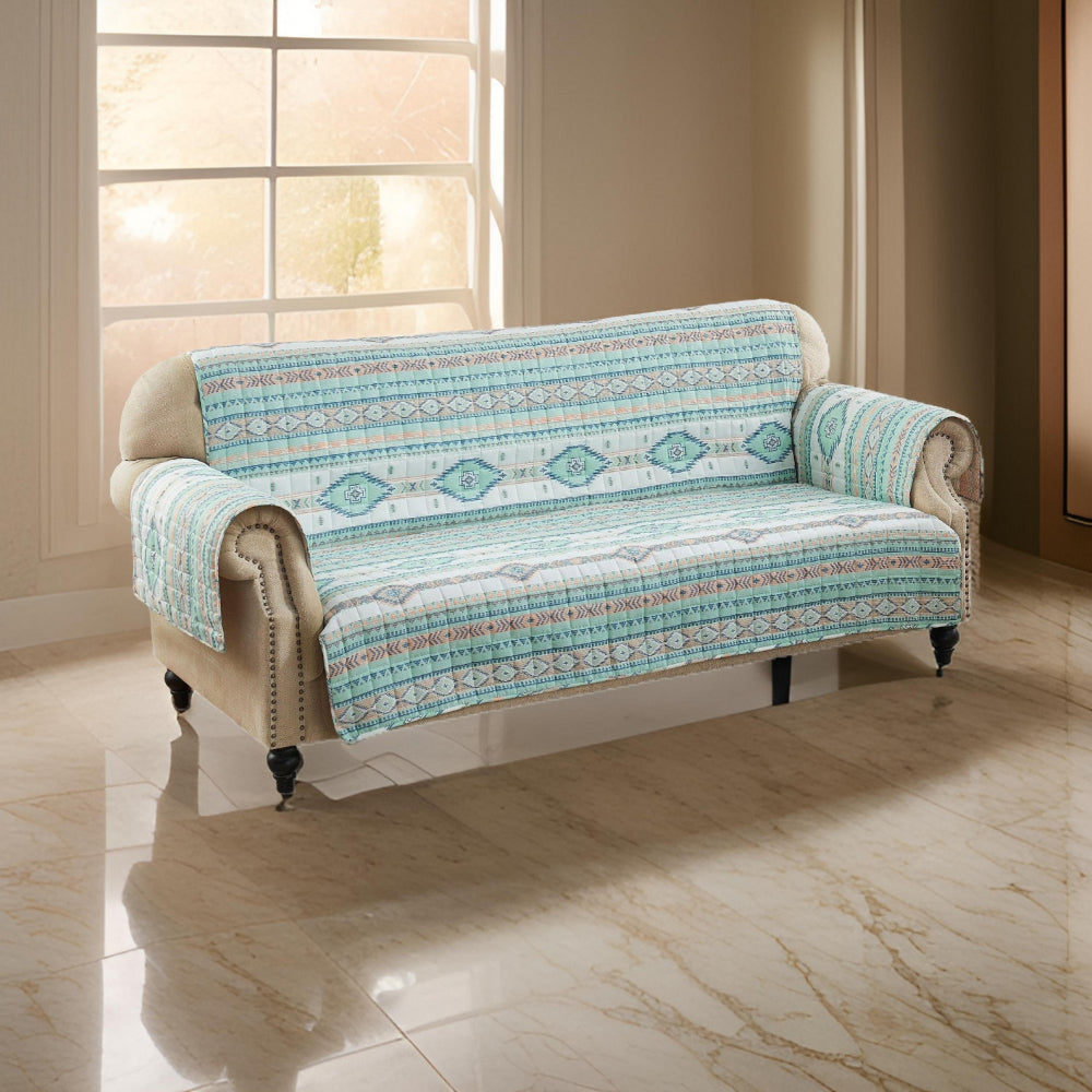 Linda 127 Inch Quilted Sofa Cover with Geometric Print, Turquoise Polyester By Casagear Home