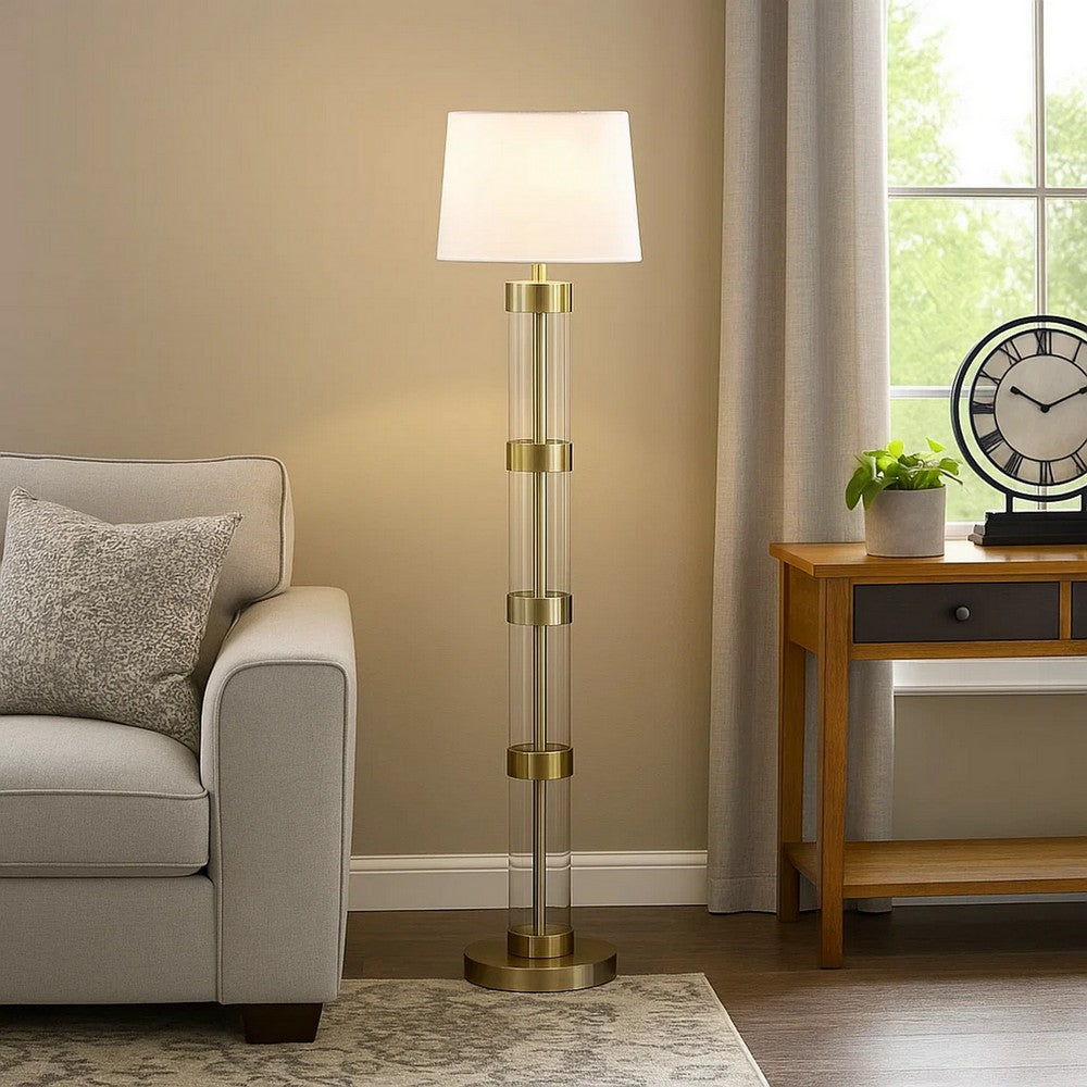 Kria 60 Inch Floor Lamp, Clear Glass Stand, Metal Bands, Antique Brass By Casagear Home