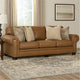 Ashley Riana 101" Sofa, 4 Accent Pillows, Caramel Brown Leather