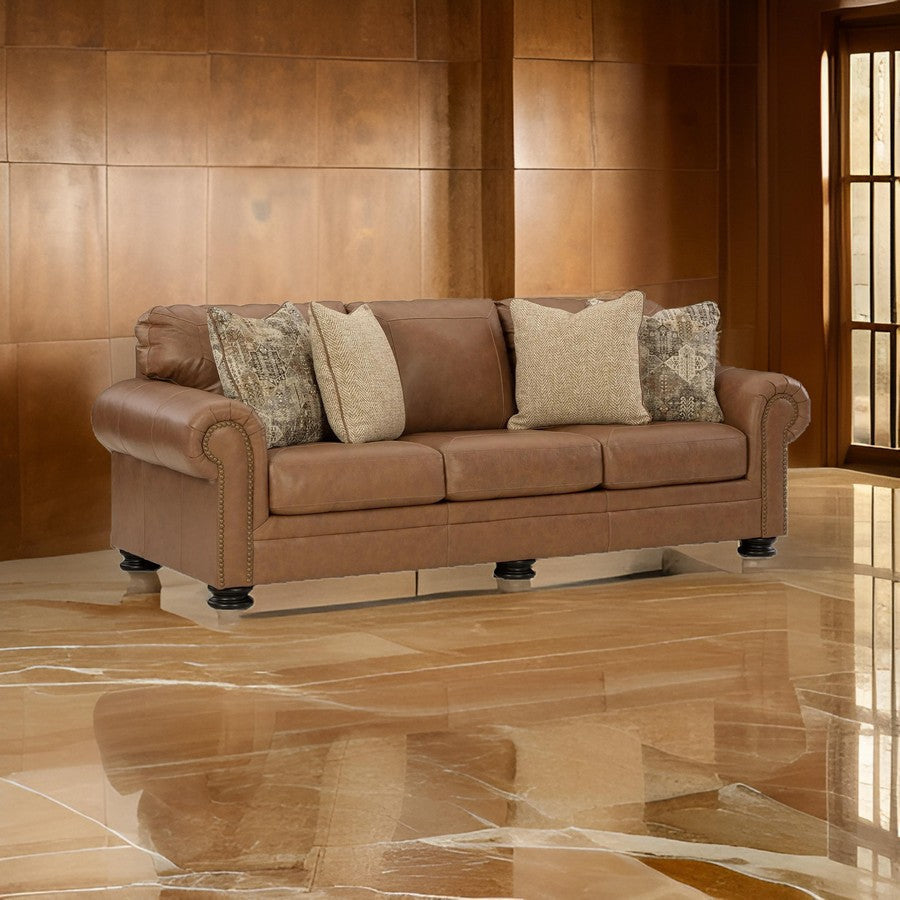 Ashley Riana 101" Queen Sofa Sleeper, 4 Pillows, Brown Leather