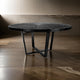 Raj 63 Inch Round Dining Table, Cross Legs Design, Black Acacia Wood, Iron By Casagear Home