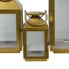 Davi Set of 3 Decorative Lanterns, Curved Handles, Glass Panel, Gold Metal By Casagear Home