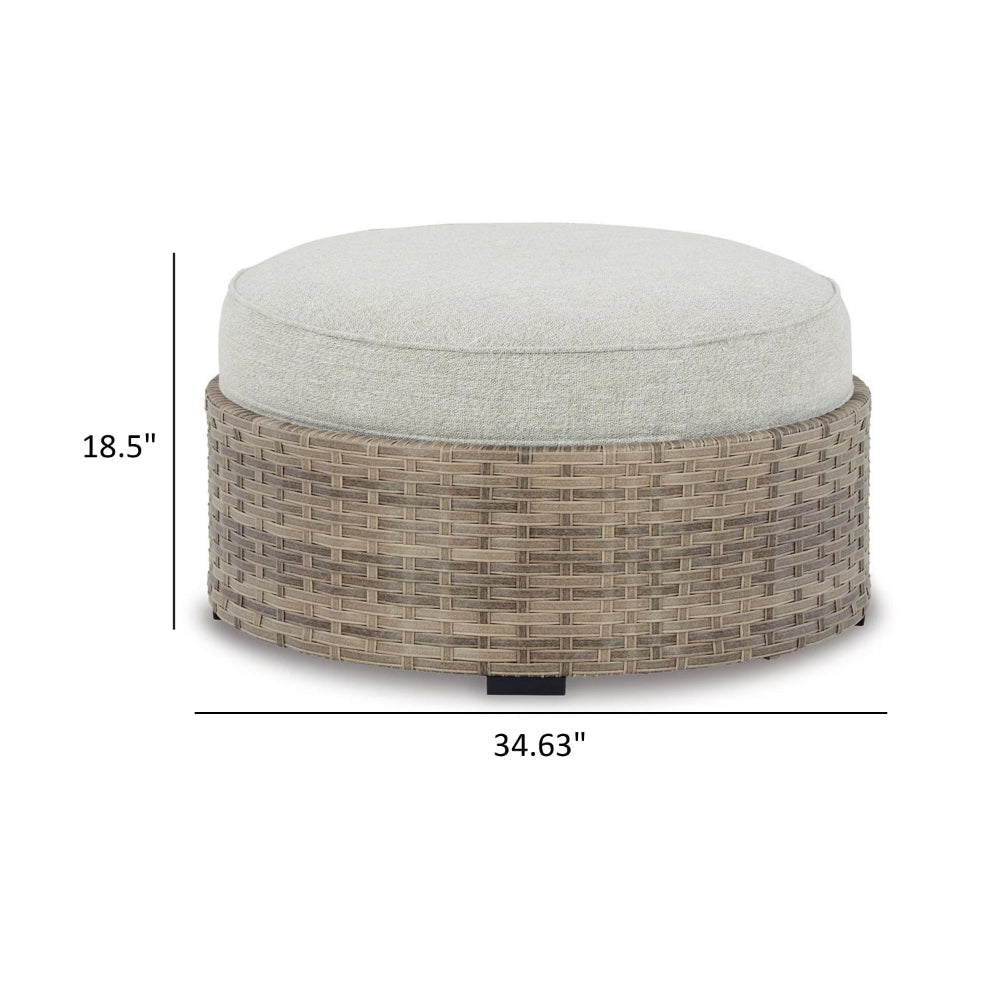 Walter 35 Inch Outdoor Ottoman with Round Cushion Top Resin Wicker Beige By Casagear Home BM315910