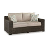 Ashley Waga 71" Outdoor Loveseat, 2 Throw Pillows, Brown, Beige