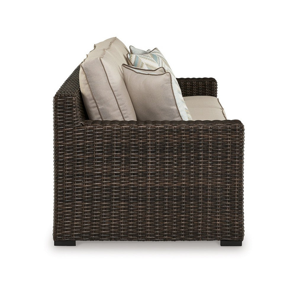 Ashley Waga 97" Outdoor Sofa, 4 Throw Pillows, Brown Wicker, Beige