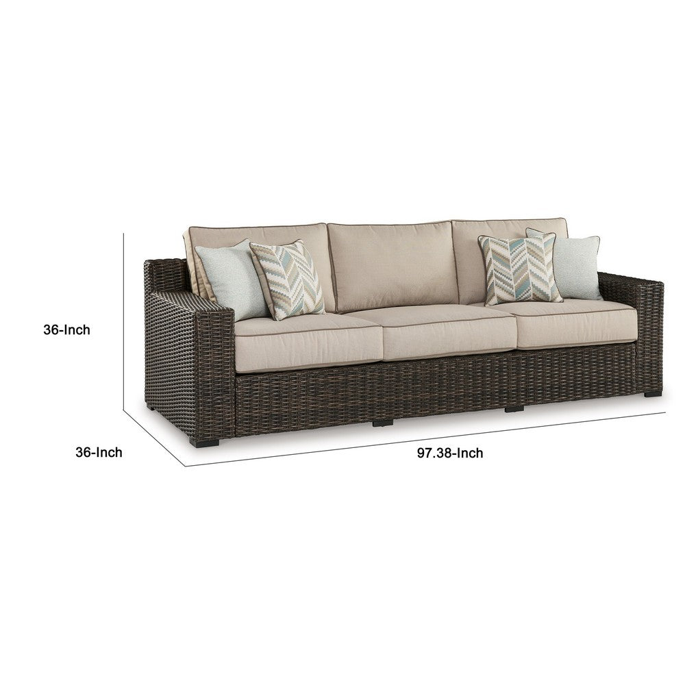 Ashley Waga 97" Outdoor Sofa, 4 Throw Pillows, Brown Wicker, Beige