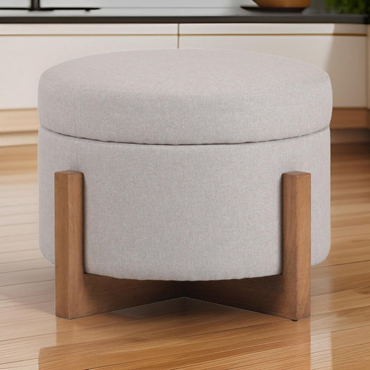 24 Inch Ottoman, Round Cushioned Storage Seat, Gray Polyester, Brown Wood By Casagear Home