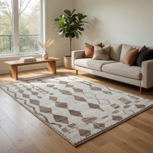 Ashley Betty 10 x 14 Area Rug, Geometric Pattern Brown Polyester