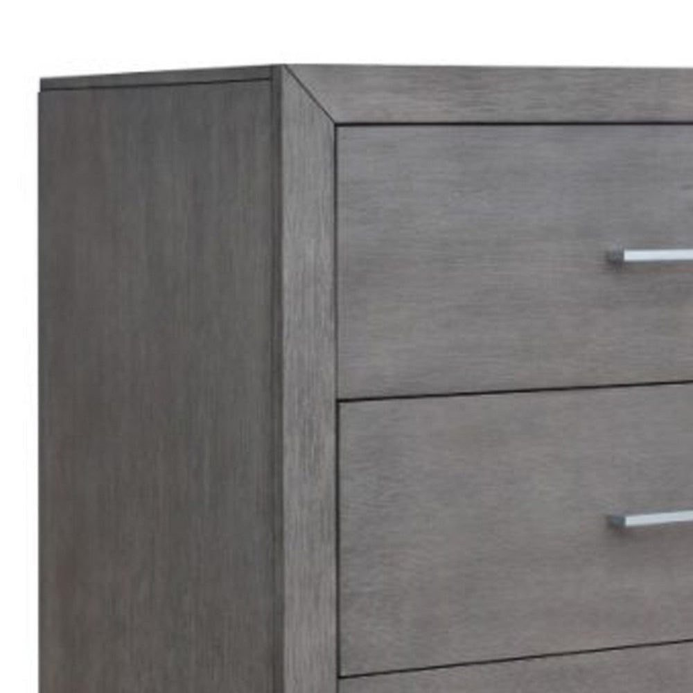 Wane Tall Dresser Chest with 4 Drawers Metal Handles Gray Wood Finish By Casagear Home BM319187