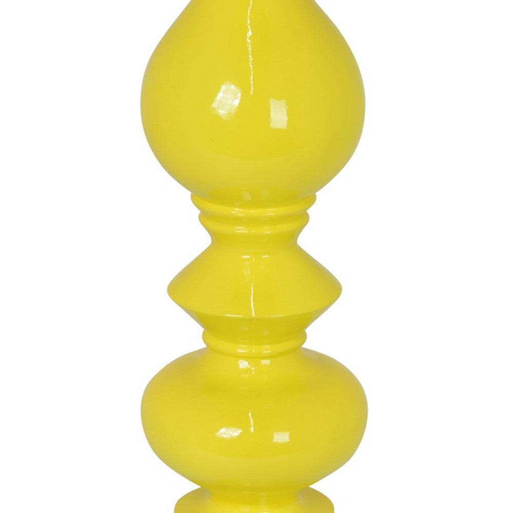Naze Tabletop Candle Holder with Turned Accents 23’’ Yellow Resin