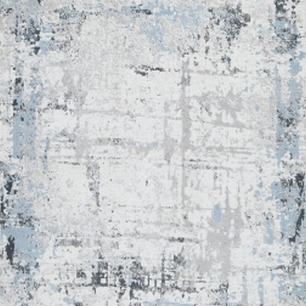 Ashley Tony 8 x 10 Large Area Rug | Blue White Machine Woven Abstract Pattern