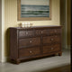Ashley Reno Wide Dresser | 7 Storage Drawers | Nickel Round Knobs | Brown