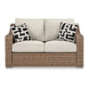 Ashley Tira Outdoor Loveseat 57 Inch Handwoven Resin Wicker Beige Pillows BM328961