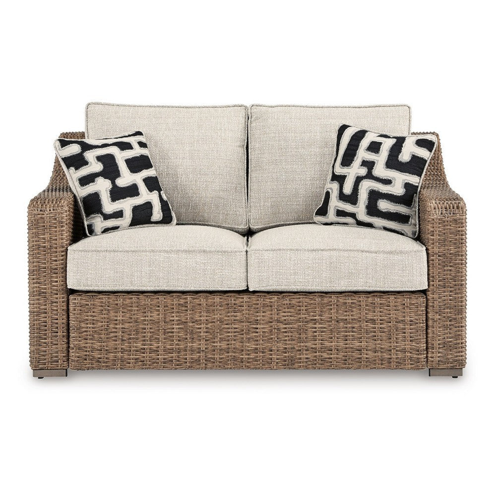 Ashley Tira Outdoor Loveseat 57 Inch Handwoven Resin Wicker Beige Pillows BM328961