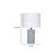 Myn Table Lamp | 18’’ | White Linen Drum Shade | Blue Leather Base
