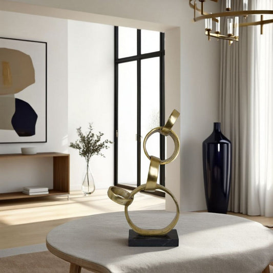 Lo Abstract Interlinked Ring Sculpture | Solid Black Base | Gold Metal