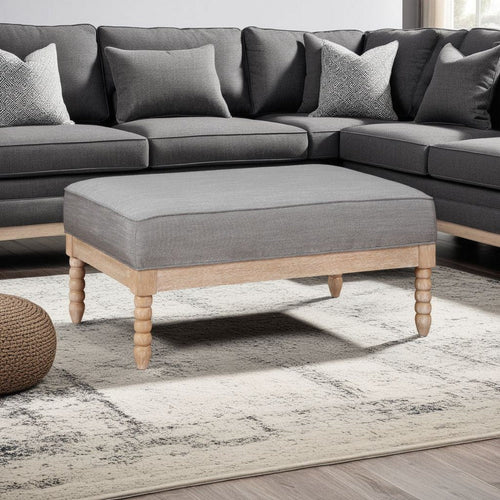 Tory Ottoman | Natural Brown Turned Wood Legs | 42" Gray Polyester