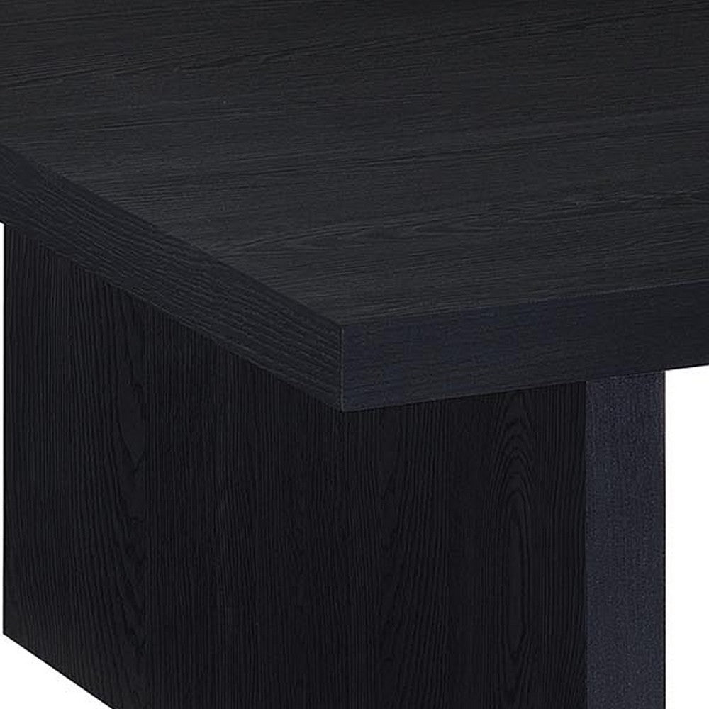 Maxy Rectangular Coffee Table with Slab-Style Base | Black Wood 54"