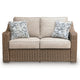 Leso Outdoor Loveseat | 2 Pillows | Beige Cushions | Brown Wicker Rattan 60"