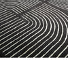 Edon Large Area Rug with Ivory Geometric Statement Design | Black Wool 8x10