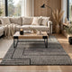 Mera Geometric Medium Area Rug | Black and Ivory Polypropylene Frieze 5x7