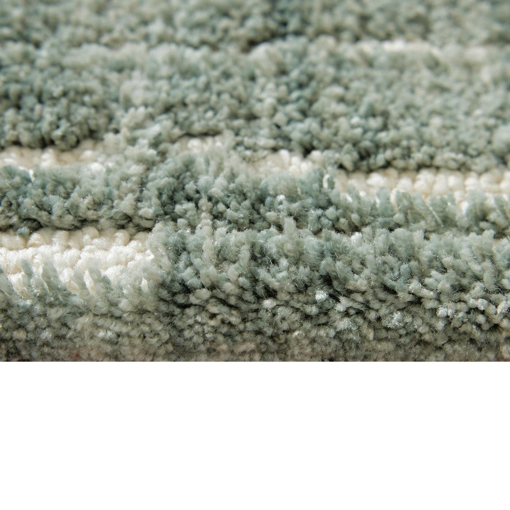 Cayo Medium Area Rug with Striped Abstract Patterns | Teal-White Polyester 5x7