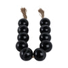 Hana Accent Garland | Carved Resin Beads | Brown Rope Tassels | Gloss Black