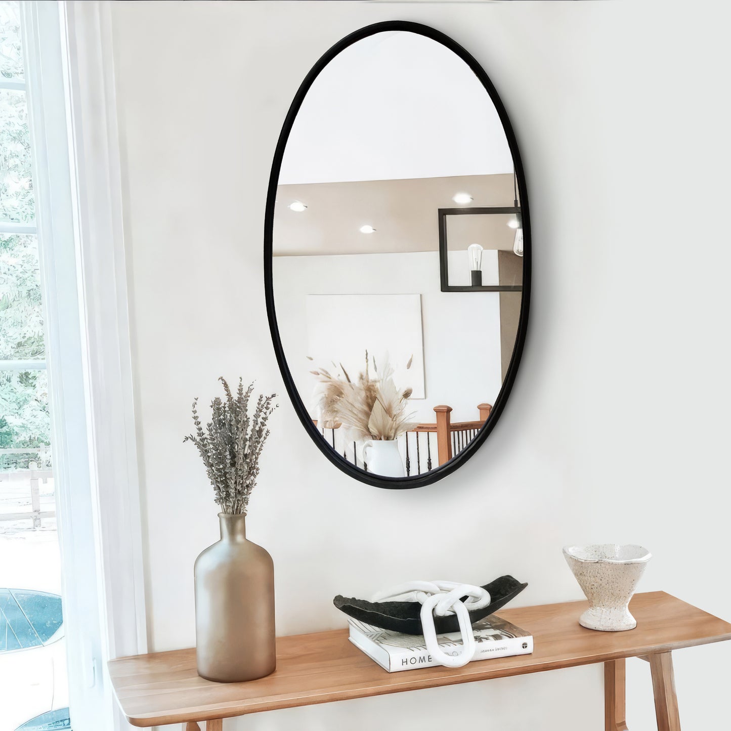 Oval Metal Wall Mirror with Framed Edges and Wooden Backing, Black By The Urban Port