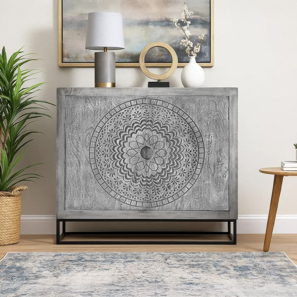 Zera 39 Inch Accent Cabinet with 2 Doors, Hand Carved Medallion, Sandblasted Gray Mango Wood, Black Iron Frame By The Urban Port