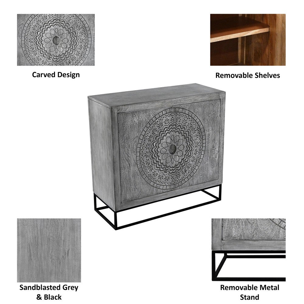 Zera 39 Inch Accent Cabinet with 2 Doors, Hand Carved Medallion, Sandblasted Gray Mango Wood, Black Iron Frame By The Urban Port
